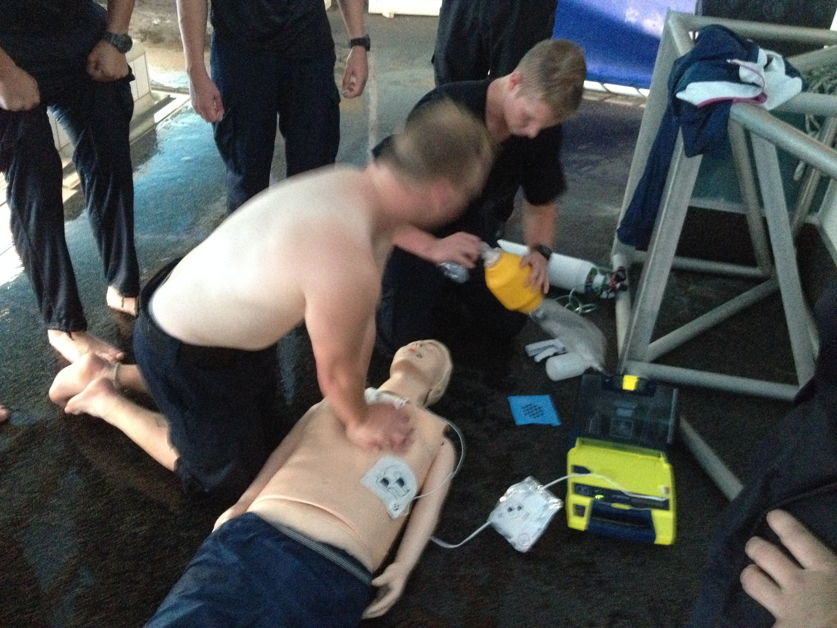 Deepka Dassanayake demonstrating first aid on a CPR dummy